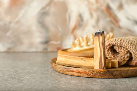 Beautiful spa composition with Palo Santo on tableの写真素材
