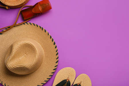 Set of beach accessories on color backgroundの写真素材