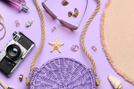 Set of female accessories and photo camera on color background, closeupの写真素材