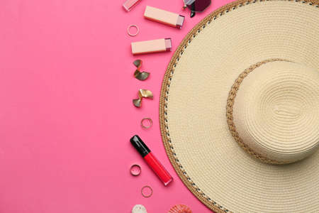 Set of female accessories and cosmetics on color background