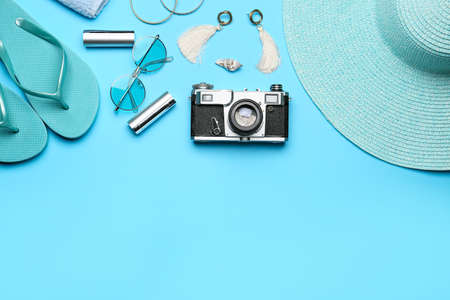 Set of beach accessories on color backgroundの写真素材