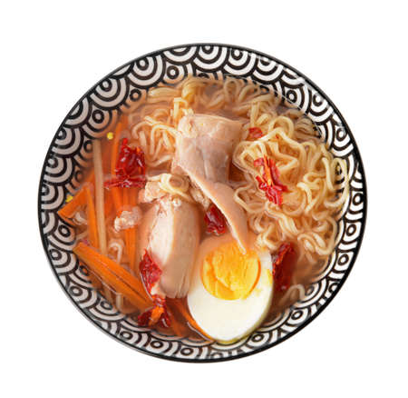 Tasty Chinese soup with chicken in bowl on white backgroundの写真素材