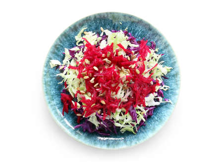 Plate with tasty cabbage salad on white background