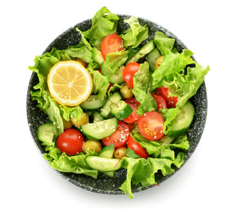 Plate with delicious mixed vegetable salad on white backgroundの写真素材