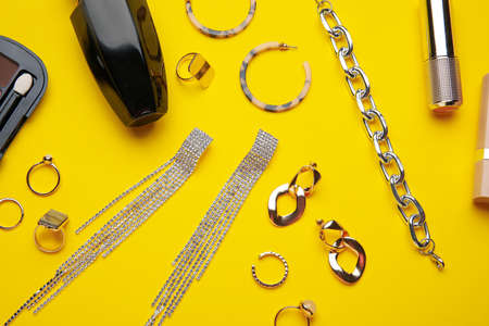 Set of female accessories on color background, closeup