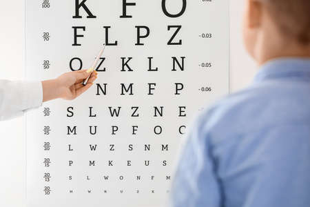 Little boy undergoing eye test in clinic