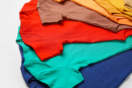 Baby clothes on white background, closeupの写真素材