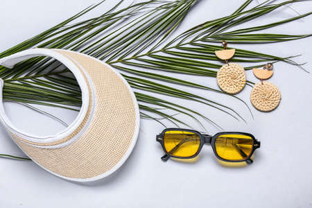 Stylish female accessories on white background