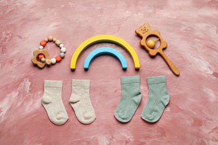 Set of baby accessories on color backgroundの写真素材