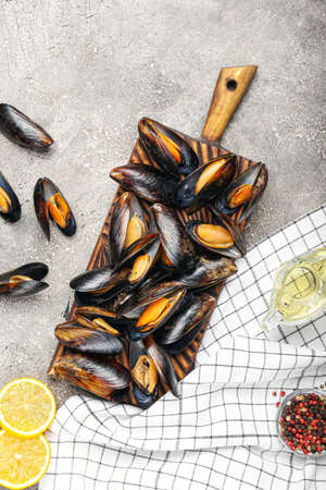 Composition with raw mussels on grunge backgroundの写真素材