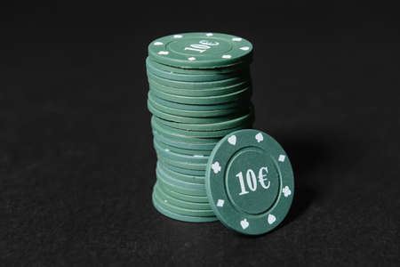 Poker chips on dark backgroundの写真素材