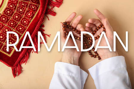 Greeting card for Ramadan with praying Muslim man