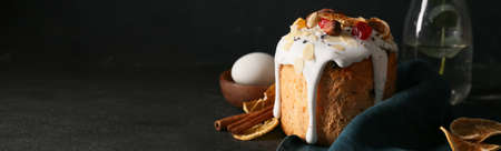 Delicious Easter cake on black background with space for text