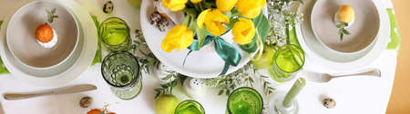 Beautiful dining table served for Easter celebration, top view