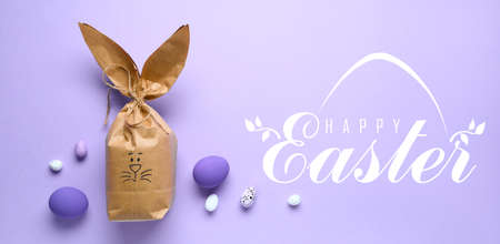 Greeting card with creative gift and painted Easter eggsの写真素材
