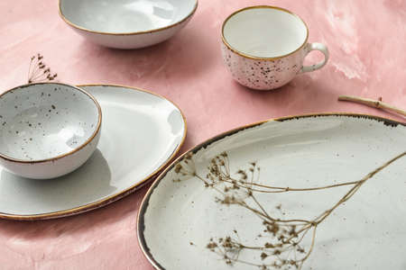 Different clean tableware on color table