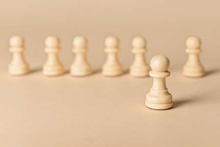Chess pieces on color background. Concept of dismissalの写真素材