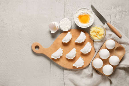 Composition with raw dumplings on light backgroundの写真素材
