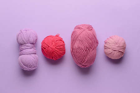 Knitting yarn on color background