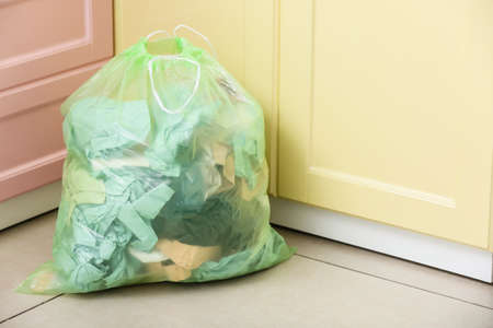 Bag with different garbage at homeの写真素材