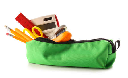 Stylish pencil case with stationery and calculator on white backgroundの写真素材