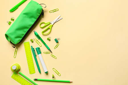 Stylish pencil case and stationery on gray backgroundの写真素材