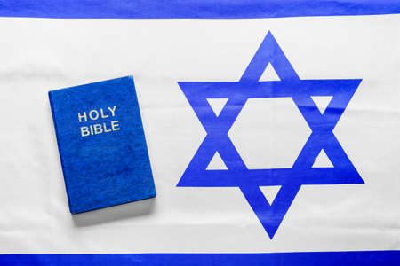 Blue Holy Bible on flag of Israelの写真素材