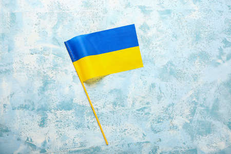 Flag of Ukraine on color backgroundの写真素材