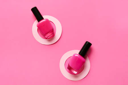 Bright nail polishes on color backgroundの写真素材