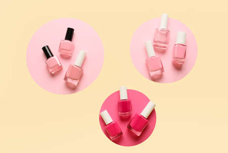 Bright nail polishes on color backgroundの写真素材