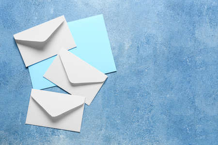 Blank card with envelopes on blue background