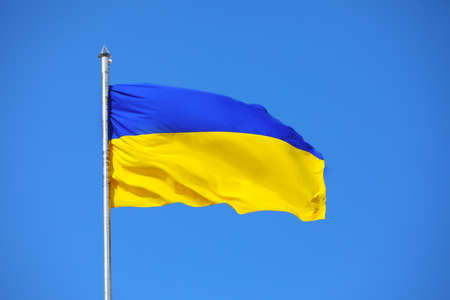 Waving national flag of Ukraine outdoorsの写真素材
