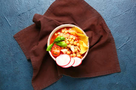Bowl with tasty pozole soup on dark backgroundの写真素材
