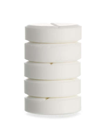 Stack of vitamin K pills on white backgroundの写真素材