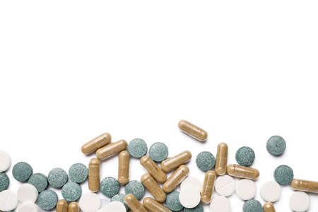 Different pills isolated on white background, closeup