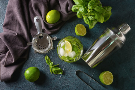 Glass of lemonade with basil on dark backgroundの写真素材