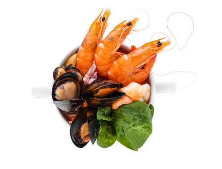 Bowl of tasty Cacciucco soup on white backgroundの写真素材