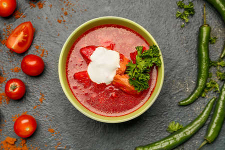 Composition with tasty borscht on dark backgroundの写真素材