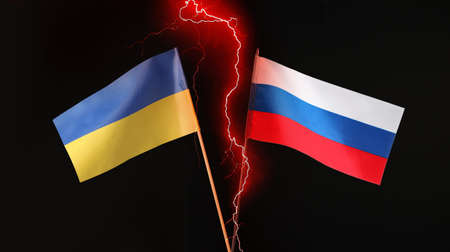 Flags of Ukraine and Russian Federation on dark background with lightning. Russia vs Ukraine war