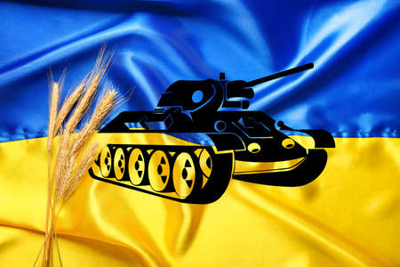 Flag of Ukraine with wheat spikelets and drawing of tank. War in Ukraineの写真素材