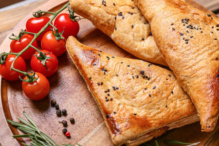 Tray with tasty Uzbek samsa, closeupの写真素材