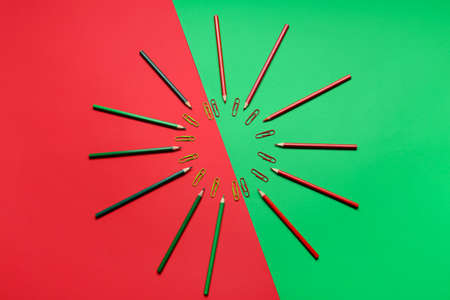 Composition with pencils and clips on color backgroundの写真素材