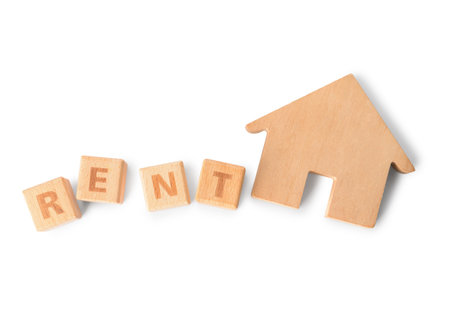Wooden house and word RENT on white backgroundの写真素材