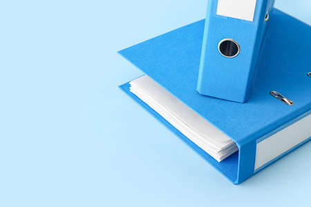 office folders on color backgroundの写真素材
