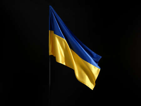 Flag of Ukraine on dark background
