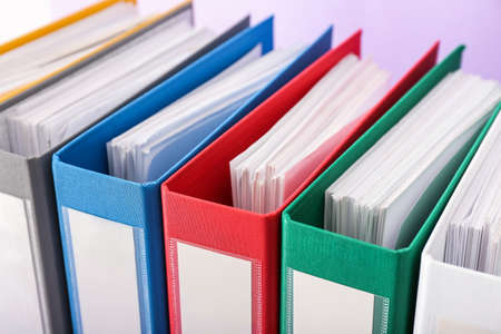 Office folders on color background, closeupの写真素材