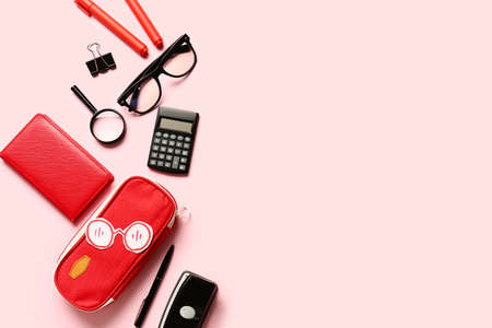 Pencil case and stationery on color backgroundの写真素材
