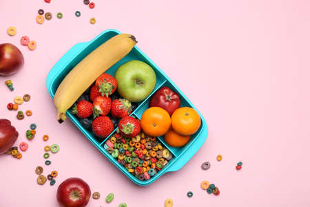 Lunchbox with tasty food on color backgroundの写真素材