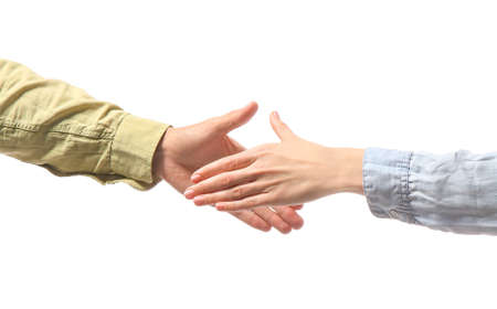 Woman and man shaking hands on white background