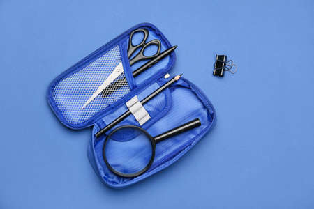 Pencil case and stationery on color backgroundの写真素材